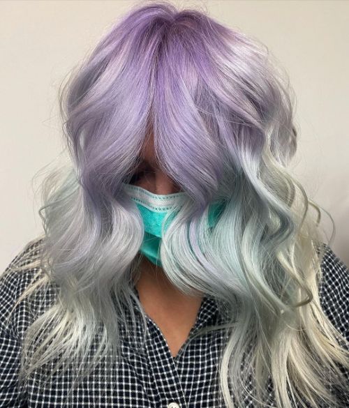 platinum blonde hair with violet purple colored roots