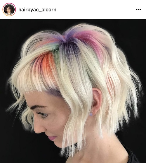 short blonde hair with dyed rainbow roots