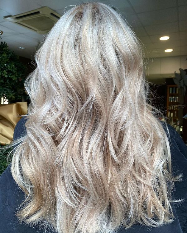 white chocolate hair with feathered layers
