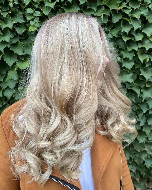 straight white chocolate hair with curled ends
