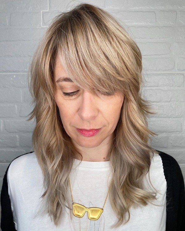 soft waves with bangs for women over 50 years old