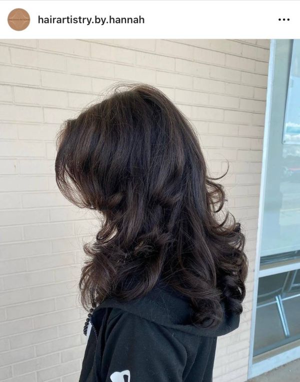 dark hair style with curly layers