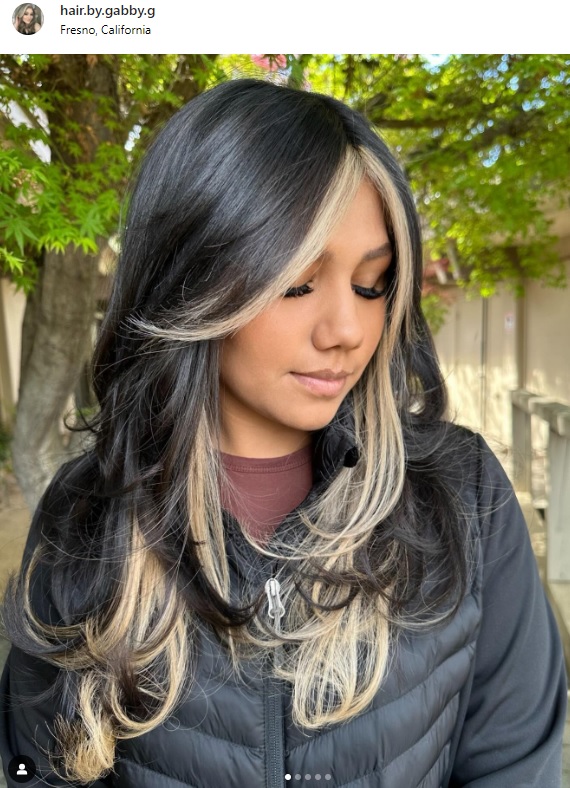 black hair with blonde highlights on layered cut