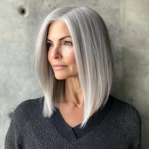 gray haircut woman over 50 face framing long bob