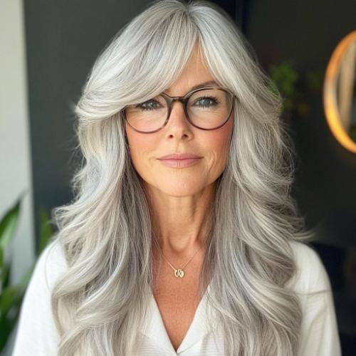 gray hairstyle over 50 long silver locks with face framing bangs glasses