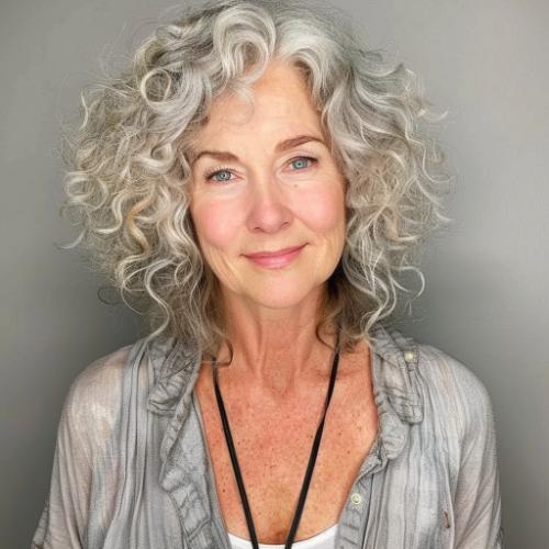 gray hairstyle over 50 curly wavy