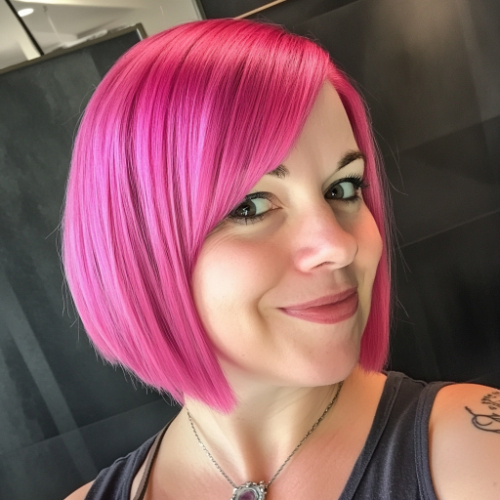 Bright pink bob haircut